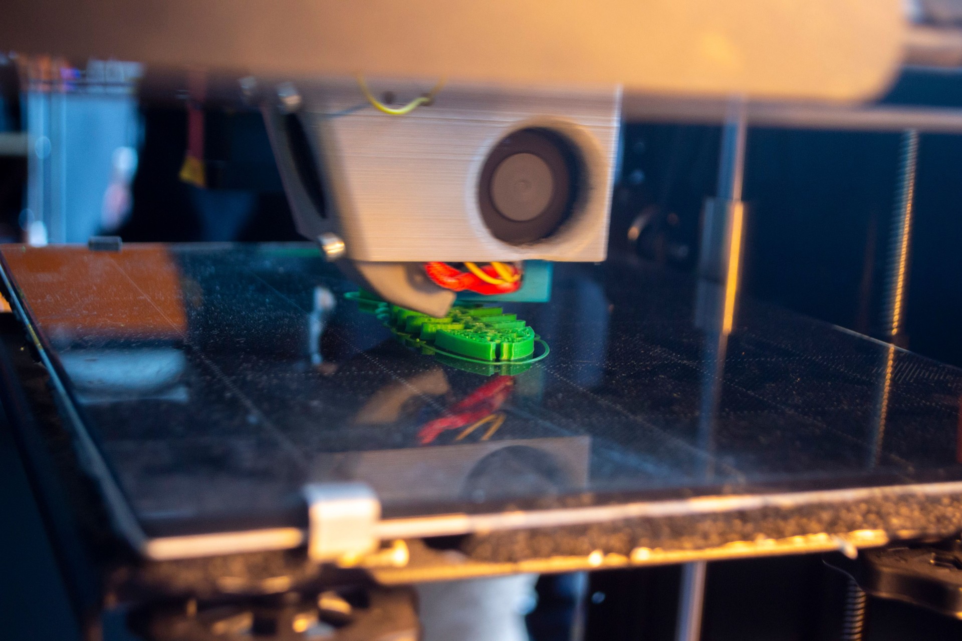 3D printer close up Working 3D printer in process printing object molten plastic